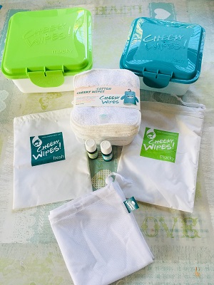 Image of the Cheeky Wipes delivery unpacked to help show you how easy it is to be more eco friendly and swap to reusable baby wipes