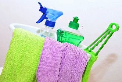 Image of a basket of general household cleaning equipment