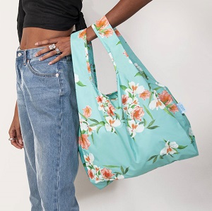 Image of a Reusable Kind Bag made from 100% recycled plastic bottles, in a lovely floral print. Kind Bag is the world's First 100% recycled plastic shopping bag, making this one of the great eco-friendly gifts for teenagers and pre-teens.