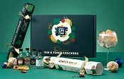 Image of a gift box with four crackers, including miniature craft gins and tonic water. With great recycling this is a lovely Christmas cracker addition for adults.