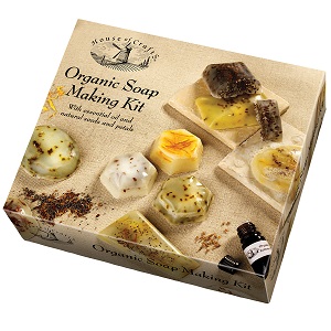 Image of an Organic Soap Making Kit. Contains: organic soap compound, organic essential oil, aniseed, linseed, poppy seeds, marigold petals and instructions in English/French/Italian.